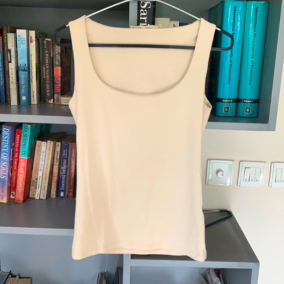 Zara Tops - Zara EUR S sleeveless stretchable top. Inner lining at the chest. Never worn.